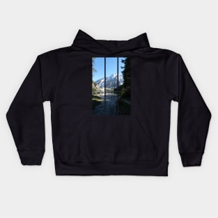 The fabulous alpine lake of Braies in the Dolomites (Bolzano). Lovely place in the Italian Alps. Boats on the water. Reflections in the water. Sunny spring day. Trentino Alto Adige (vertical) Kids Hoodie